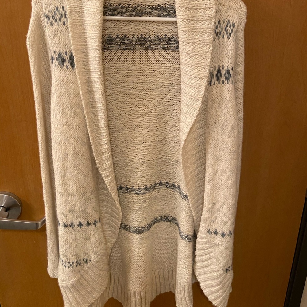 Cream cardigan with blue-green designs